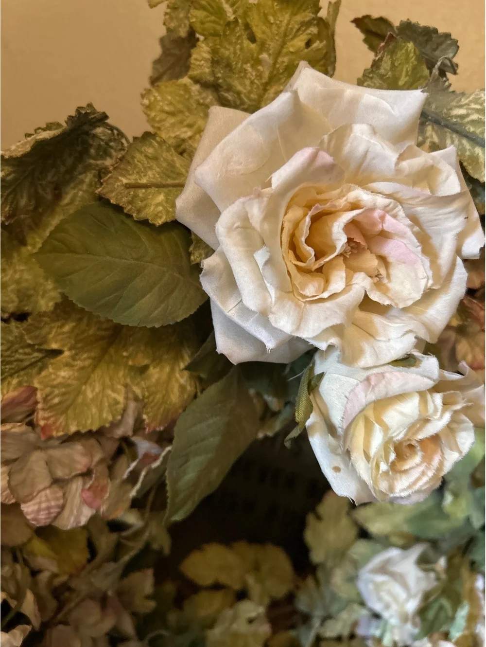 Decorative Floral Grapevine Wreath with Cream Roses and Green Leaves